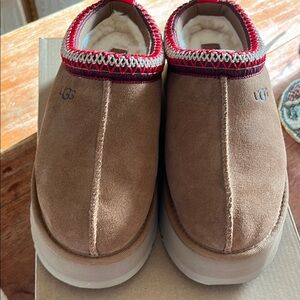 UGG Brown Slip-On Shoes with Red Trim